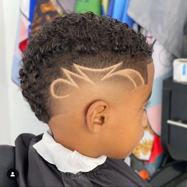 Child with tribal-style fade design at Culture Kutz Nyali