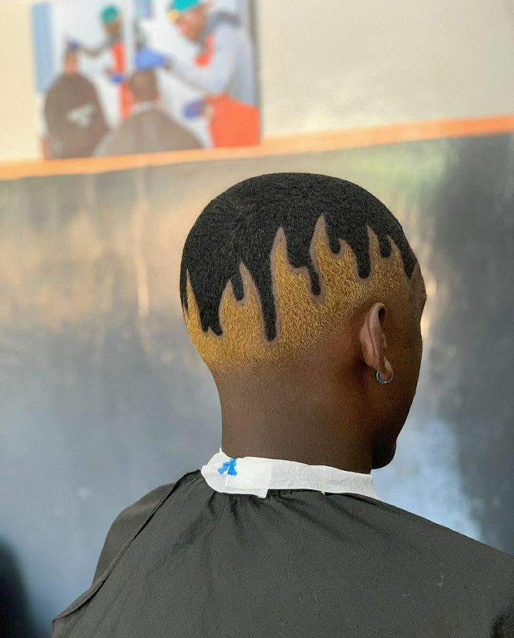 Bold hair color styling with a clean fade finish at Culture Kutz Nyali
