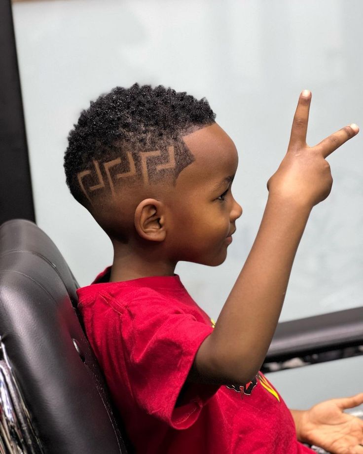 Young client with a neat kids haircut at Culture Kutz Nyali